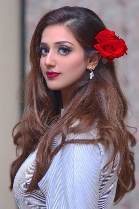 Jannat Mirza in white dress with red rose and beautiful rose