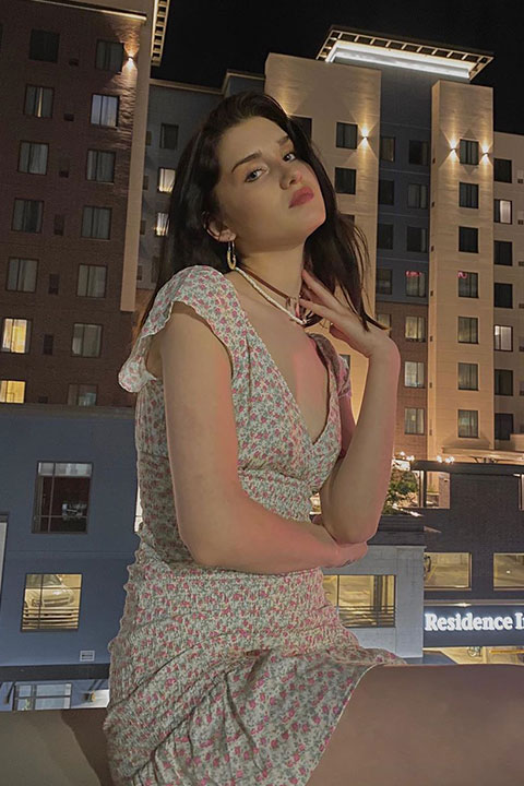 Brett Monique in beautiful dress at roof