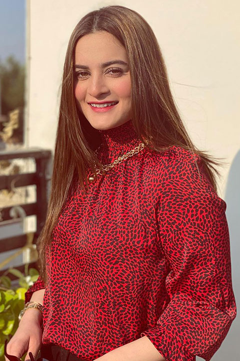 Aimen Khan in cheeta red dress
