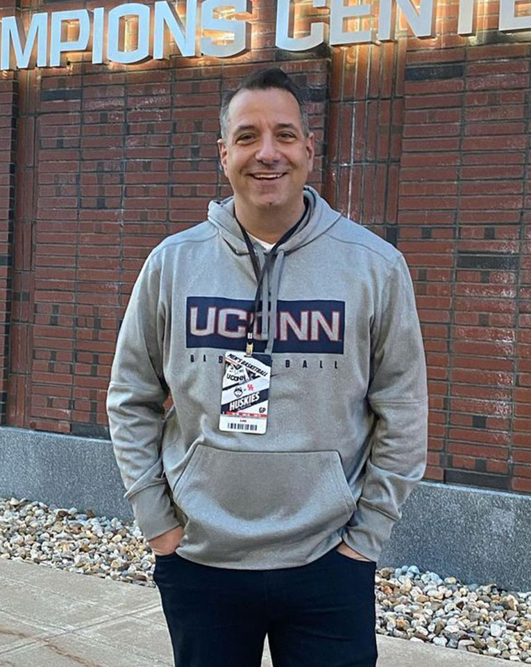 Marc damelio in grey hoodie and blue cotton jeans
