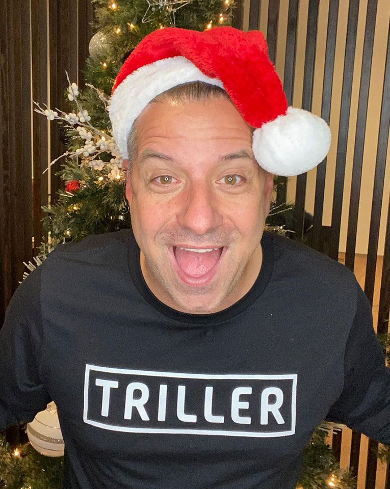 Marc damelio say wao in black shirt and santa claus cape