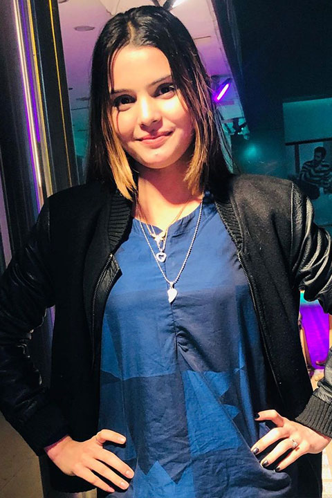 Silent girl in blue dress and black jacket