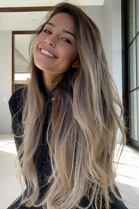 Rachel Hofstetter (Valkyrae) smiling while looking in camera