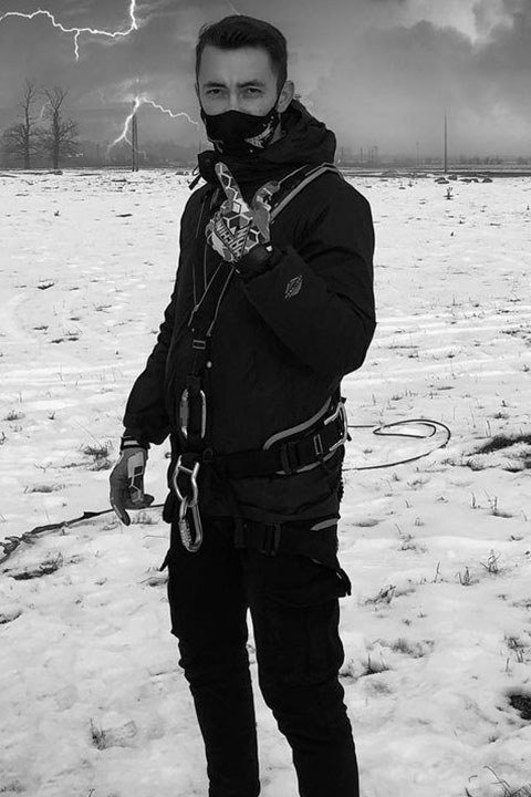 Michael Nicolae making pose on snow
