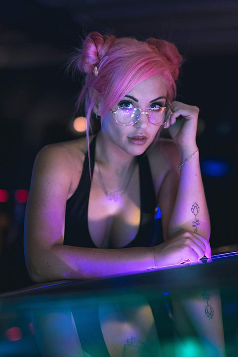 Bianca McIntyre is looking hot in black blouse and pink hairs.