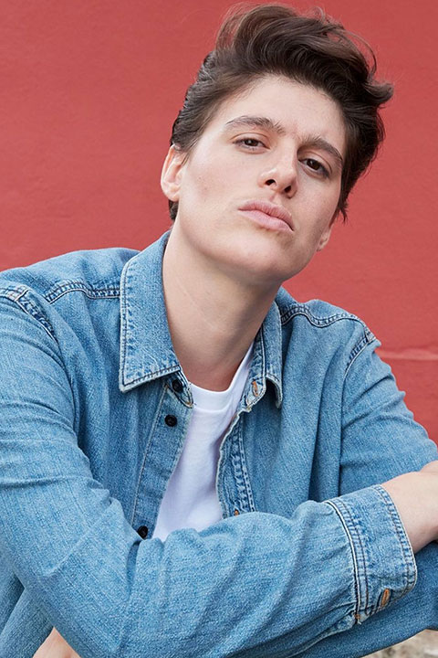 Rain Dove is denim jacket and white shirt