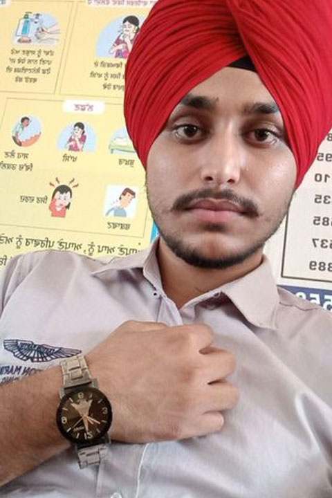 Jagjodh Bela showing his watch and taking selfie