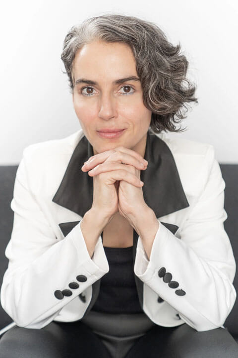 Clarice Assad Is looking pretty in grey hair.